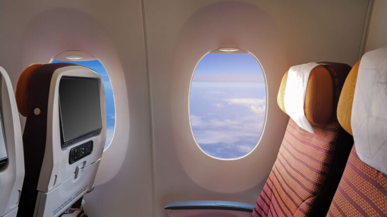 A Flight Attendant Reveals Why the Overhead Bin Is the Worst Place to Store Your Coat